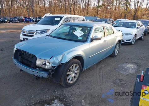 2009 Chrysler 300 Limited z USA, uszkodzony, nr VIN 2C3KA33V69H543994